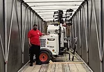 bobcat-salvation-army-donation-aurora-co-2-051426_jpg.jpg