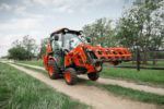 KIOTI Tractor Introduces new Grapple Line and CX Series Cab Tractor