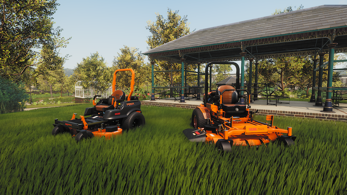 Two virtual lawn mowers sitting in virtual grass